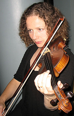 A close-up of a violinist